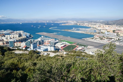 Gibraltar airport runway and city free photo