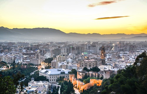 Malaga and city cathedral sunset free photo