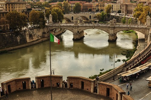 Italian flag near Tiber river in Rome free photo